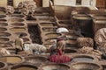 FEZ, MOROCCO Ã¢â¬â FEBRUARY 20, 2017 : Men working at the famous Chouara Tannery in the medina of Fez, Morocco Royalty Free Stock Photo